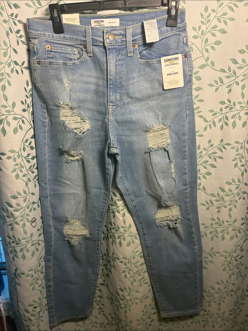 Signature Light Wash Ripped Skinny Jeans